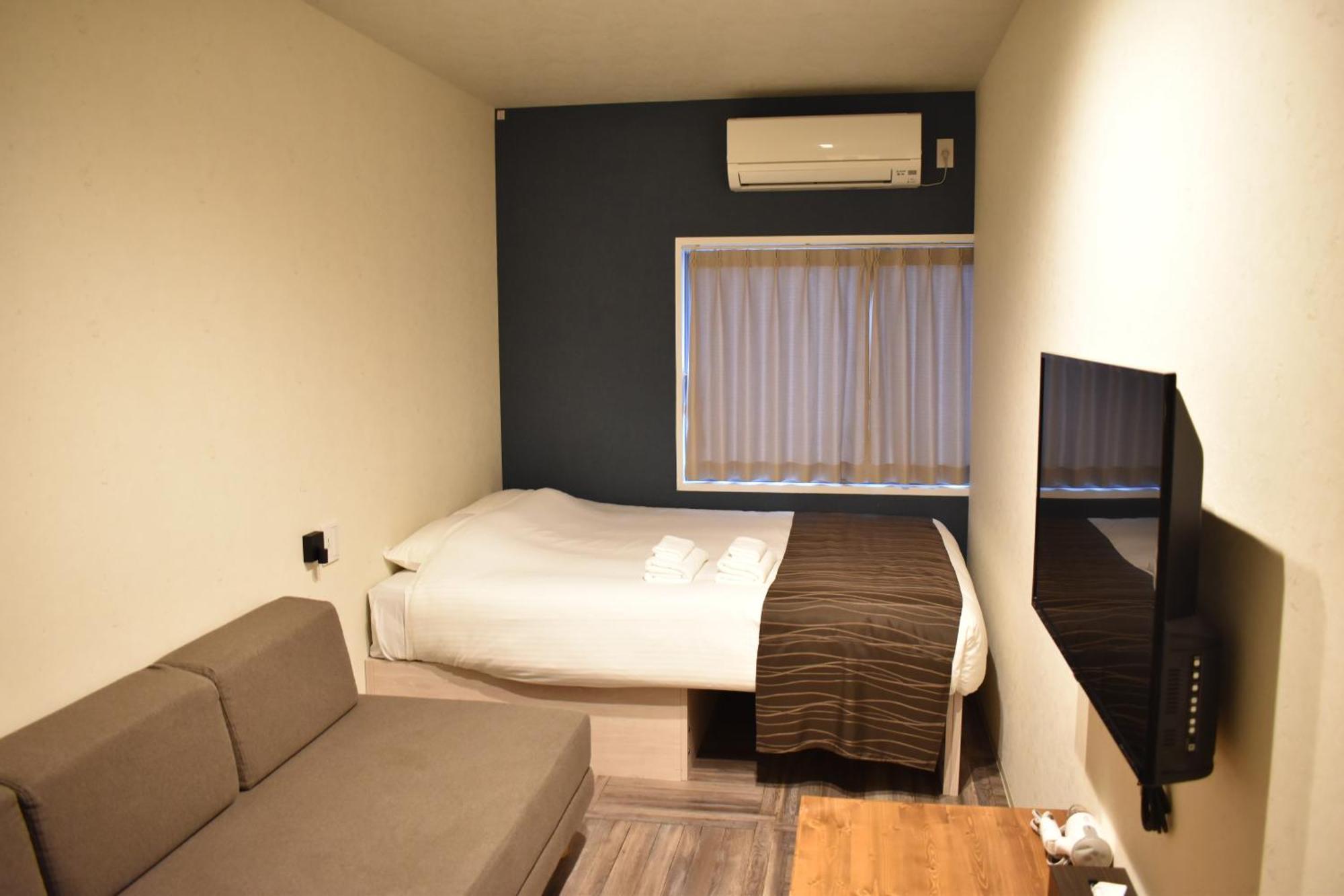 Shinsaibashi House Hotel Oszaka Szoba fotó