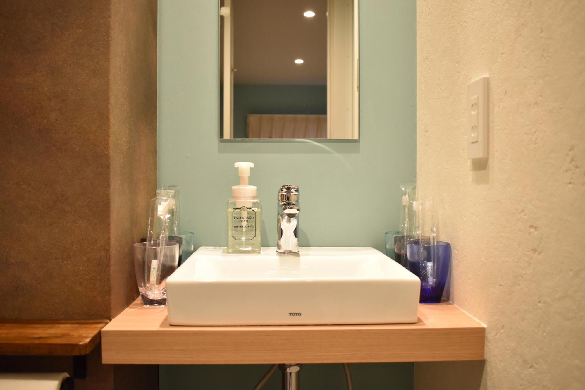 Shinsaibashi House Hotel Oszaka Szoba fotó