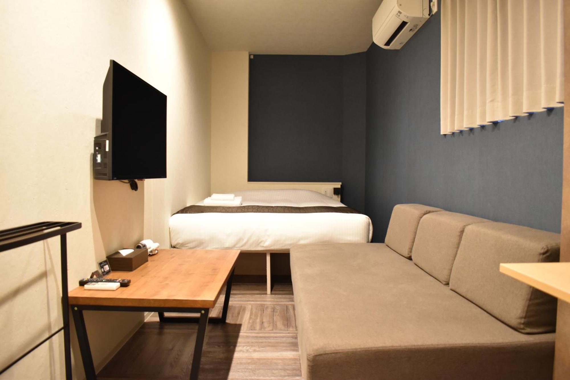 Shinsaibashi House Hotel Oszaka Szoba fotó