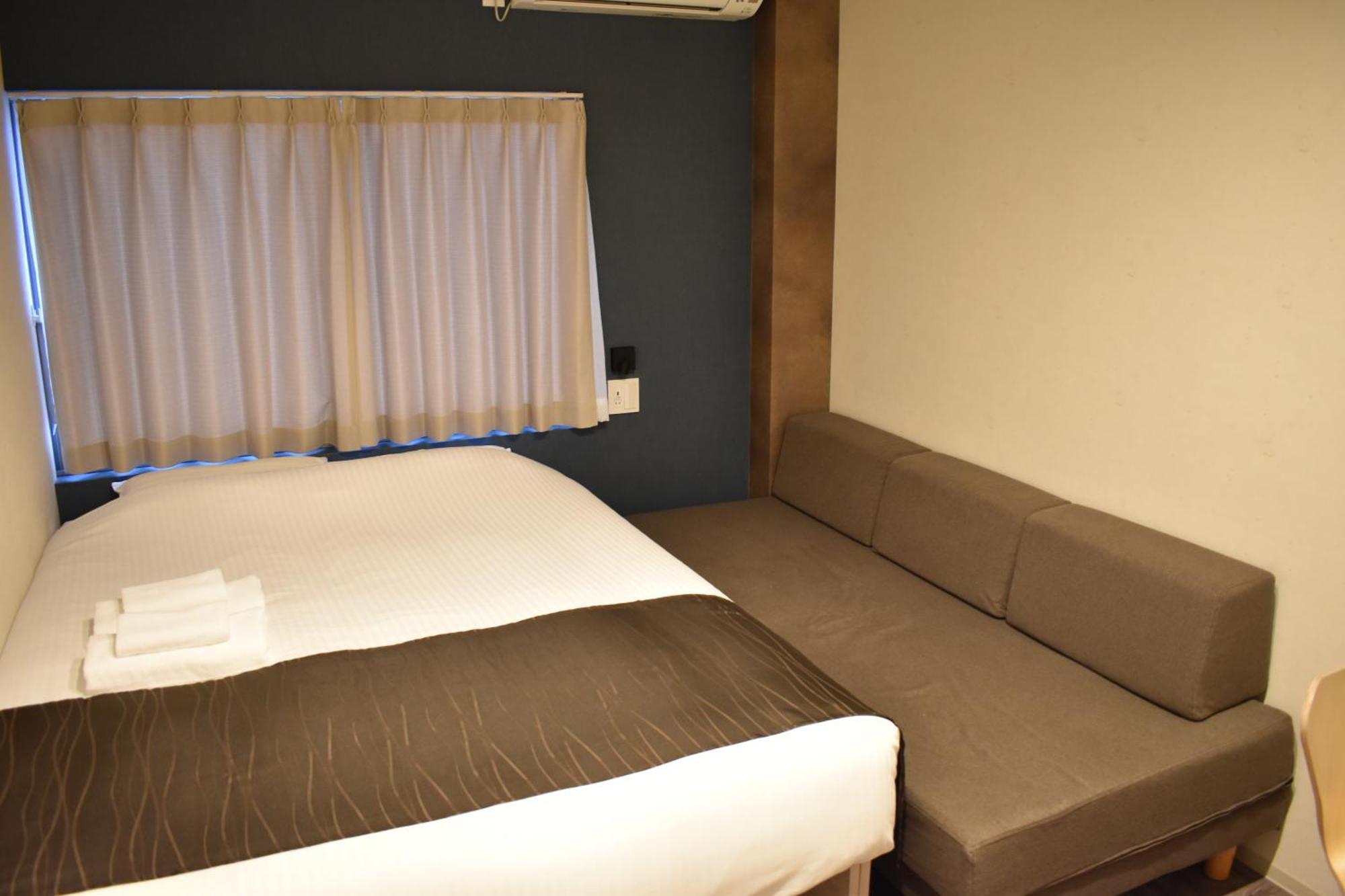 Shinsaibashi House Hotel Oszaka Szoba fotó