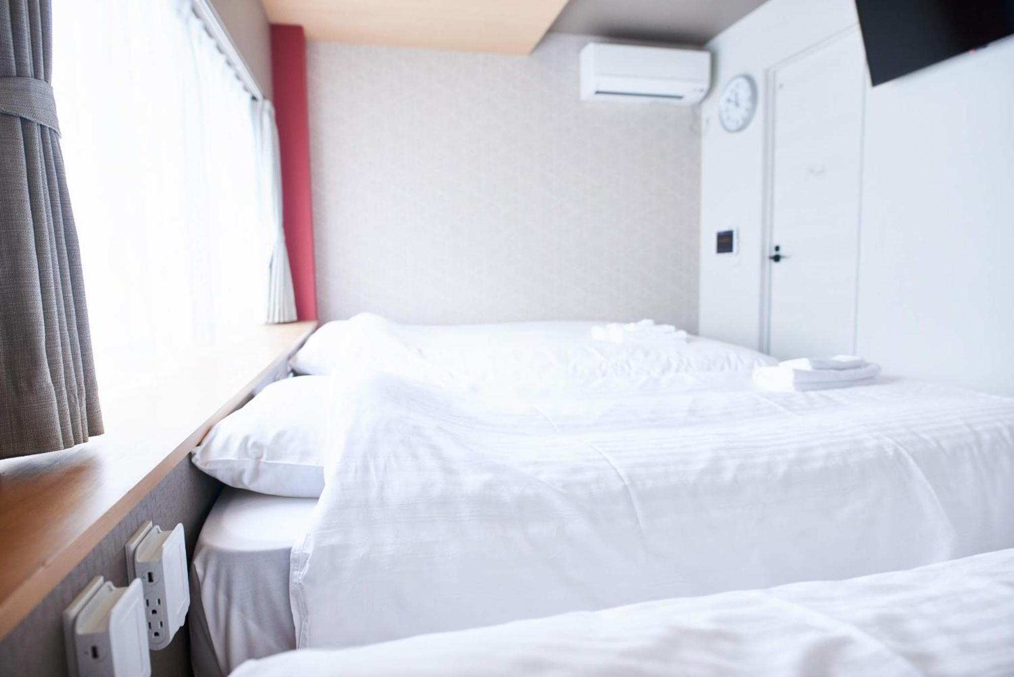 Shinsaibashi House Hotel Oszaka Szoba fotó