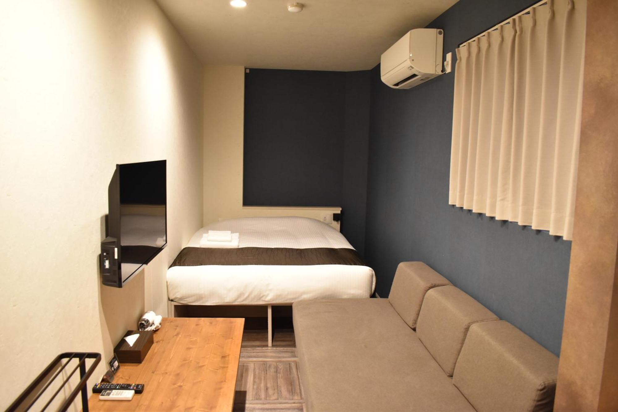 Shinsaibashi House Hotel Oszaka Szoba fotó